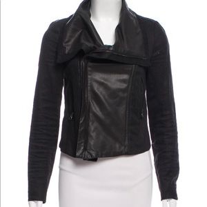 VINCE asymmetrical denim jacket with leather accents and zip closure at front